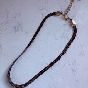 Sleek Black Choker Necklace with Gold Accents